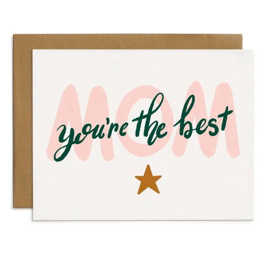 Greeting card with a charming design that features a large, light pink “Mom” elegantly overlaid with dark green lettering that proclaims “you’re the best,” all set against a soft white background. A little gold star shines below, adding a touch of sparkle to your message.