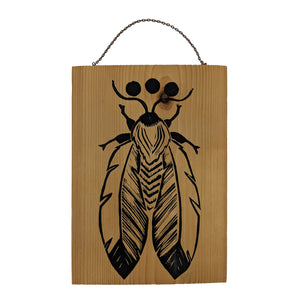 Feather Moth on Wood